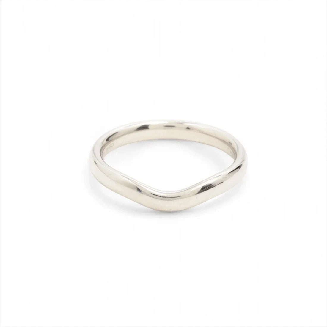 TIFFANY CURVED BAND RING PT950: Tiffany Curved Band Ring Pt950 Brand: Tiffany Type: Ring Material: Pt950 Color: Silver Size: 7.25 US Accessories: None Accessories Notice: When purchasing pre-owned goods, please refer to