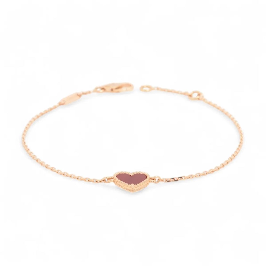 VAN CLEEF & ARPELS SWEET HEARTS CARNELIAN BRACELET 750(PG): Van Cleef & Arpels Sweet hearts Carnelian Bracelet 750(PG) Brand: Van Cleef & Arpels Type: Bracelet Material: 750(PG) Color: Pink Gold Size: Bracelet length:17.5 Accessories: None Accessories