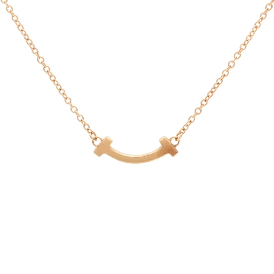 TIFFANY T SMILE MINI NECKLACE 750(PG): Tiffany T Smile Mini Necklace 750(PG) Brand: Tiffany Type: Necklace Material: 750(PG) Color: Pink Gold Size: Chain length:45.5 Accessories: None Accessories Notice: When purchasing pre-owned