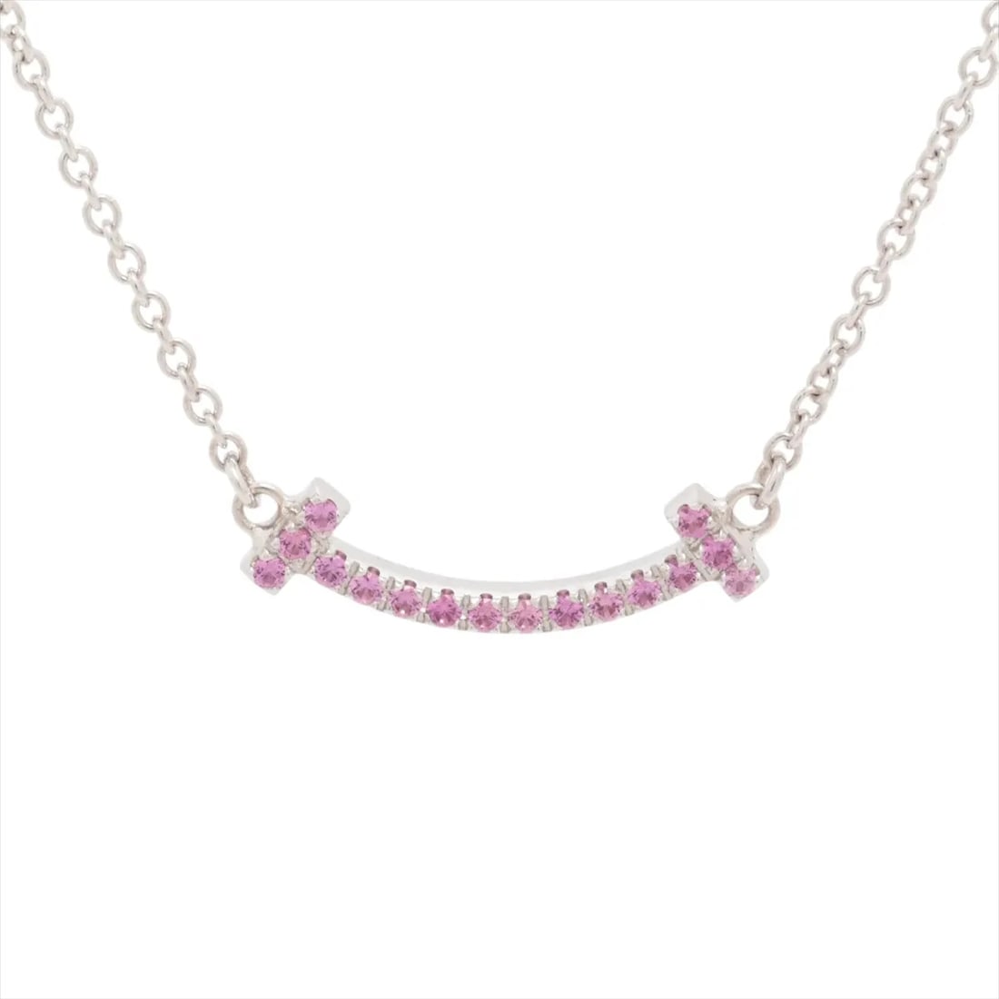 TIFFANY T SMILE MINI PINK SAPPHIRE NECKLACE 750(WG): Tiffany T Smile Mini Pink sapphire Necklace 750(WG) Brand: Tiffany Type: Necklace Material: 750(WG) Color: White Gold Size: Chain length:46.7 Accessories: None Accessories Notice: When
