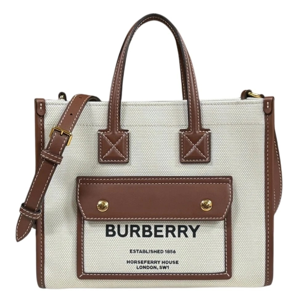 BURBERRY SHOULDER BAG COTTON LEATHER 2WAY MINI FREYA TOTE: BURBERRY Shoulder Bag cotton leather 2way mini freya tote Brand: BURBERRY Type: Shoulder Bag Material/Exterior Material: cotton Color/Exterior Color: Brown / natural x Tan Size: W9.1 x H7.1 x