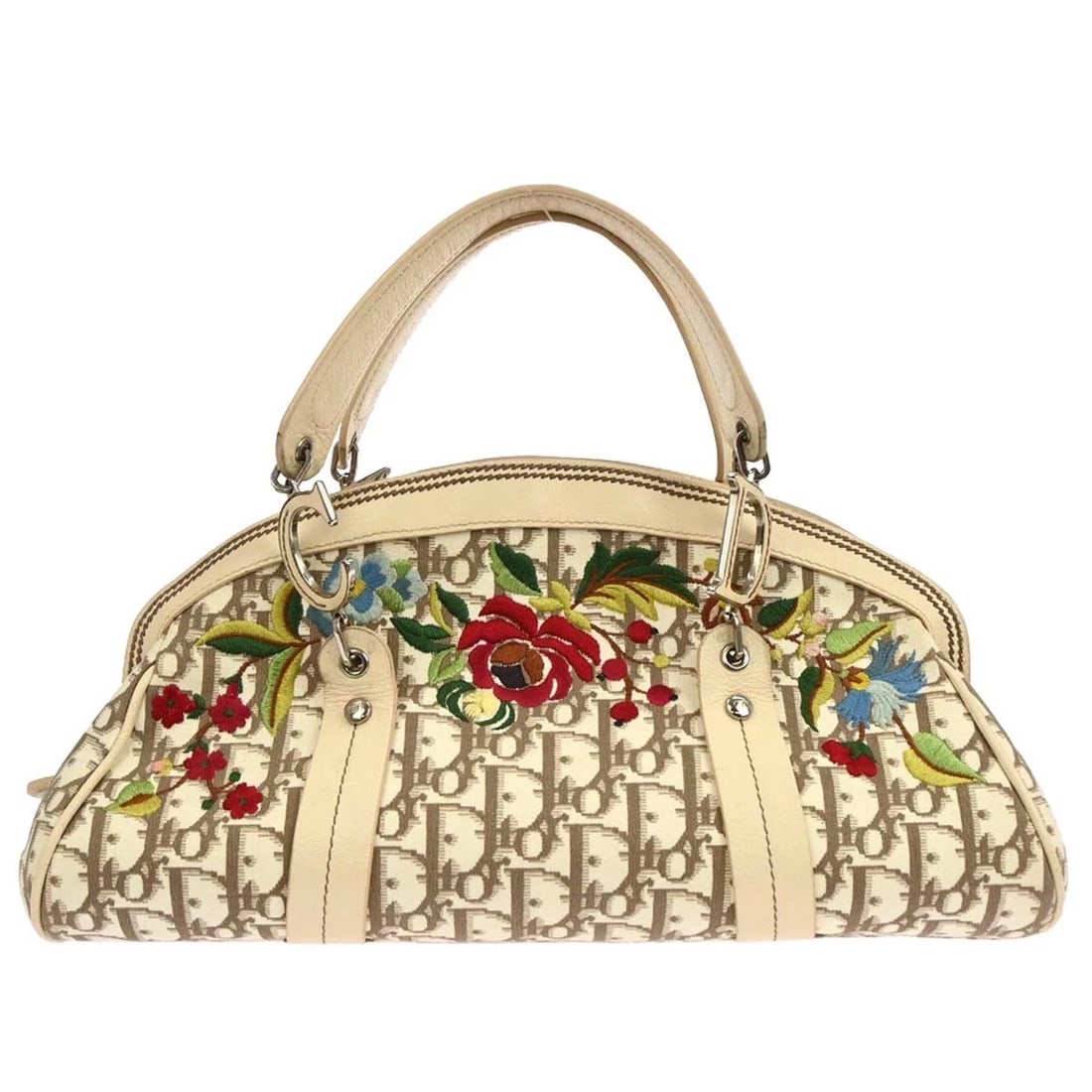 CHRISTIAN DIOR BEIGE FLORAL EMBROIDERED TROTTER HANDBAG: Christian Dior Beige Floral Embroidered Trotter Handbag Brand: Dior Type: Top Handle Bag Material/Exterior Material: Canvas, Leather Color/Exterior Color: Beige, Size: W 13.8 x H 6.3 x D 5.5 " Han