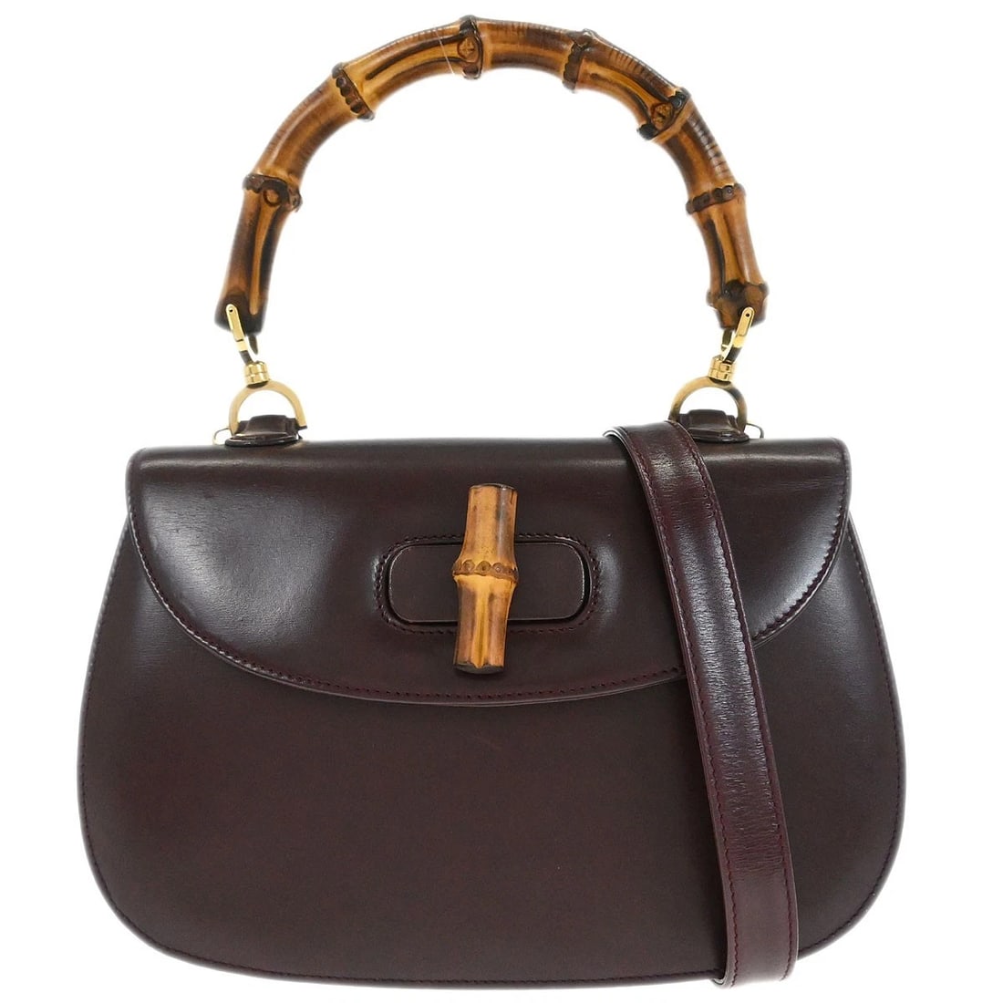 GUCCI BROWN BAMBOO 2WAY HANDBAG: Gucci Brown Bamboo 2way Handbag Brand: Gucci Type: Top Handle Bag Material/Exterior Material: Leather Color/Exterior Color: Brown Size: W 10.6 x H 7.1 x D 3.5 " Handle Drop. 4.7 " Strap Drop. 16.9