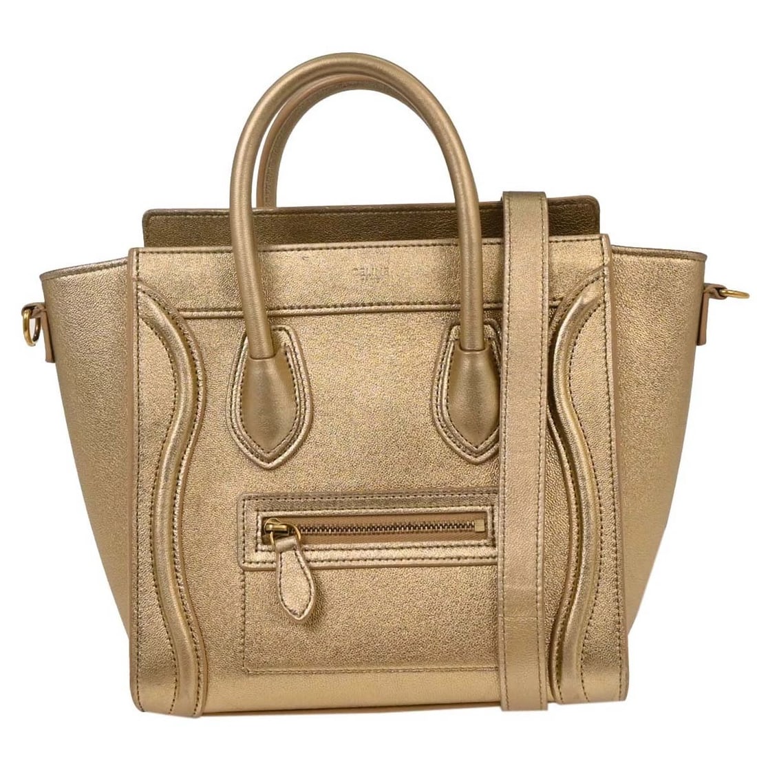 CELINE GOLD LEATHER NANO LUGGAGE TOTE BAG: Celine Gold Leather Nano Luggage Tote Bag Brand: CELINE Type: Top Handle Bag Material/Exterior Material: Leather Color/Exterior Color: Gold Size: W 7.9 x H 7.5 x D 3.9 " Handle Drop. 1.6 " Strap D