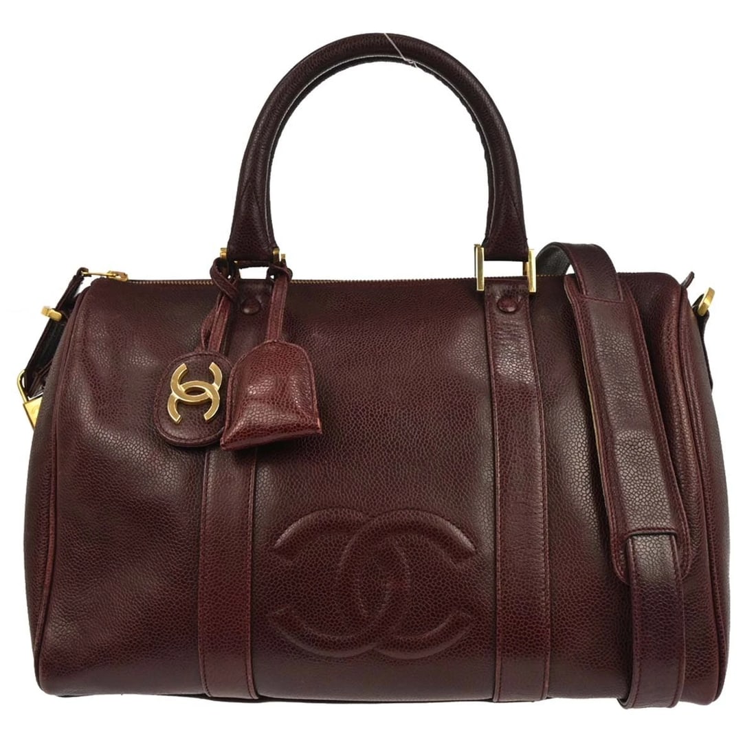 CHANEL BORDEAUX CALFSKIN 2WAY HANDBAG: Chanel Bordeaux Calfskin 2way Handbag Brand: CHANEL Type: Duffle Material/Exterior Material: Caviar Skin Leather Color/Exterior Color: Bordeaux Size: W 14.2 x H 9.1 x D 6.7 " Handle Drop. 5.1 " St