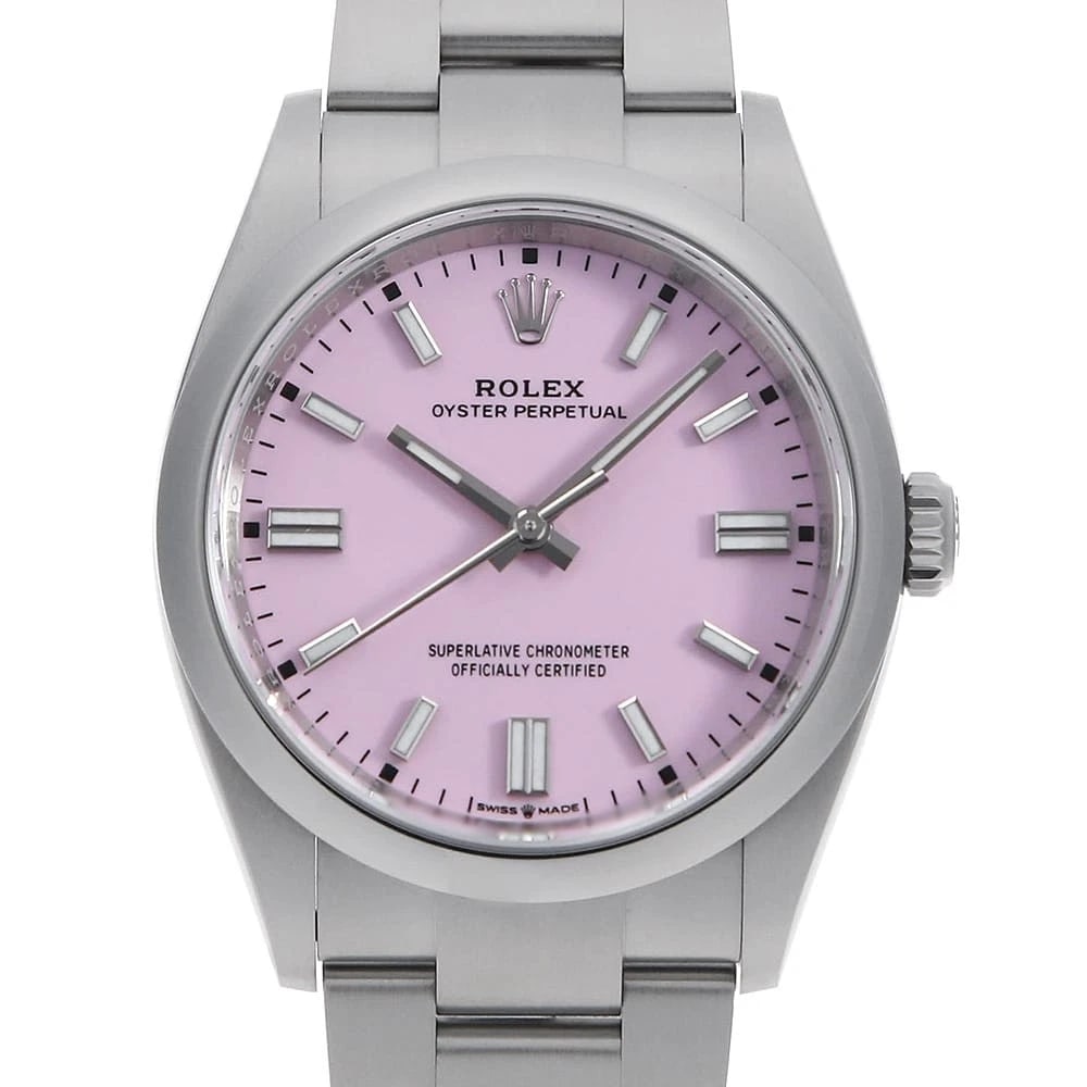 ROLEX OYSTER PERPETUAL CANDY PINK: ROLEX Oyster Perpetual Candy pink Brand: ROLEX Type: Wrist watch Material: Band MaterialStainless Steel, Case MaterialStainless Steel Color: Candy Pink Size: Case:W36mm Circumference of