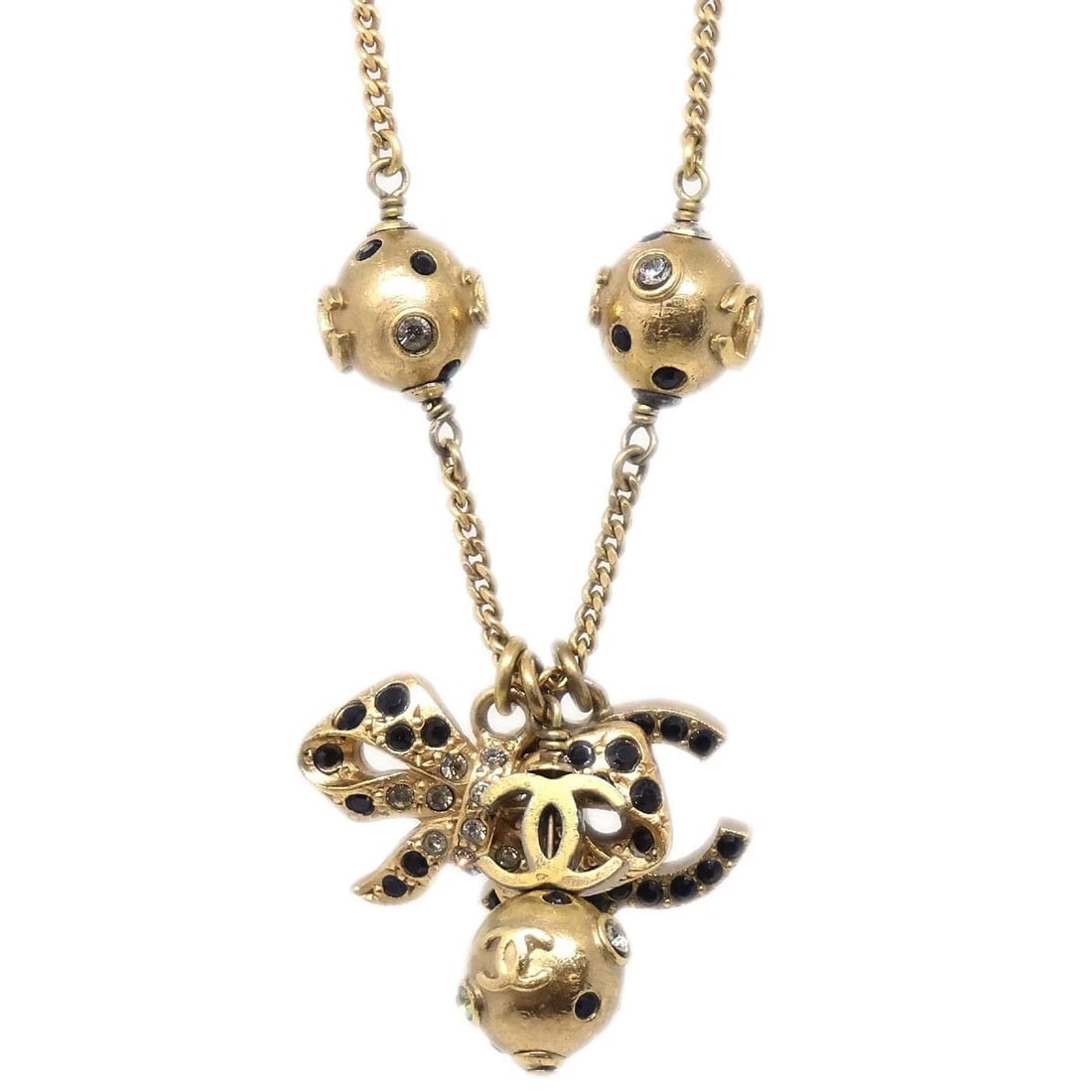 CHANEL ICON GOLD CHAIN PENDANT NECKLACE: Chanel Icon Gold Chain Pendant Necklace Brand: Chanel Type/Style: Necklace Material: Gold Plated, Color: Gold, Black Size: Chain(Overall) : 38.0 cm Charm(Bow): W 2.3 x H 1.6 cm Accessories: