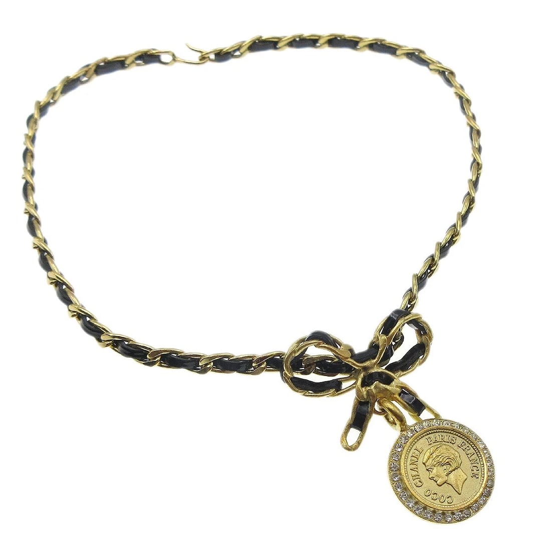 CHANEL BOW MEDALLION CHARM RHINESTONE PENDANT NECKLACE: Chanel Bow Medallion Charm Rhinestone Pendant Necklace Brand: CHANEL Type/Style: Pendant Material: Gold-plated,Patent Leather, Color: Gold, Black Size: Chain(Overall) : 35.0 cm Top : Diameter : 2.