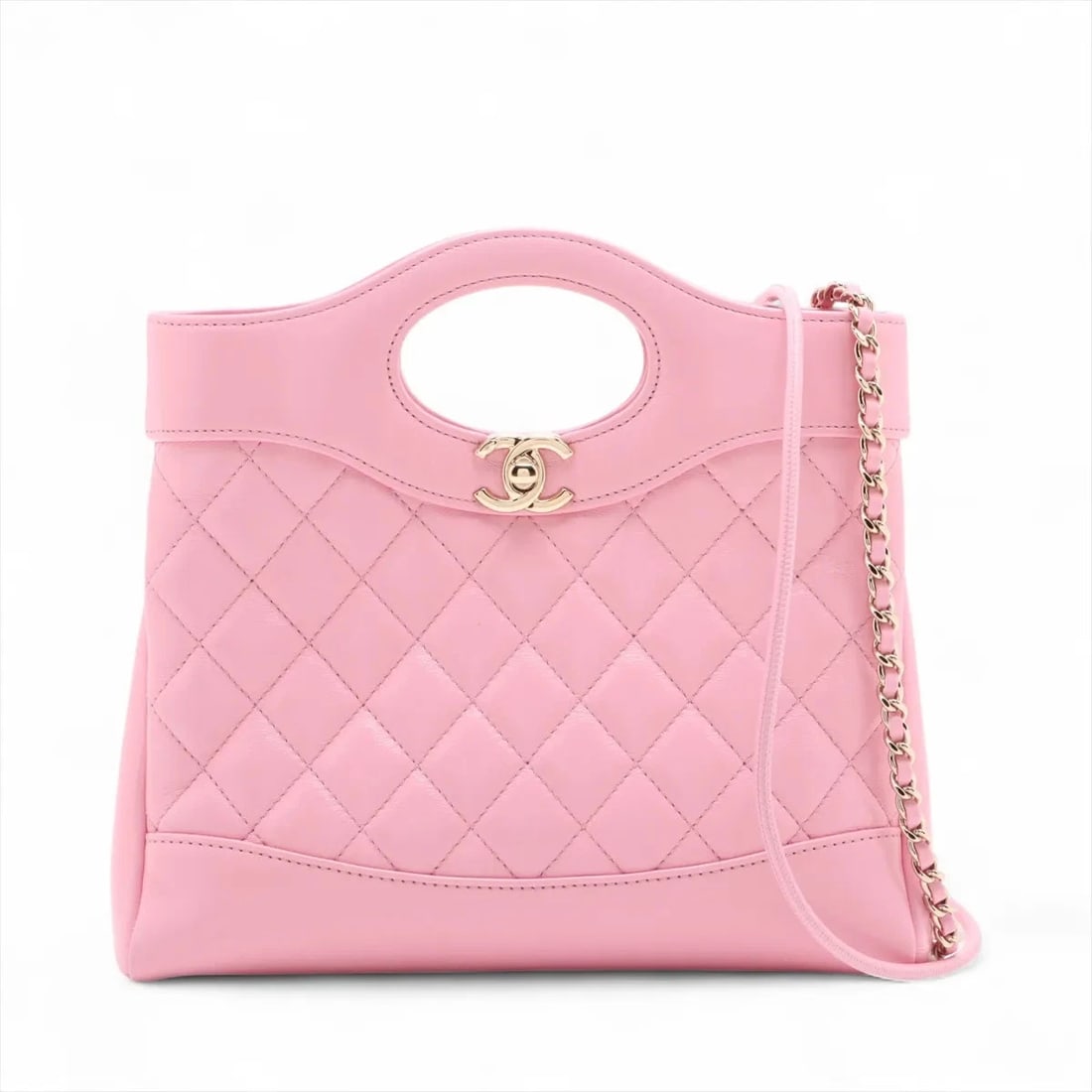 CHANEL 31 SHINY CALFSKIN 2 WAY HANDBAG: Chanel 31 shiny calfskin 2 Way Handbag Brand: Chanel Type: Hand bag Material: shiny calfskin Color: Pink Size: Height:8.5inch Length:9.1inch Depth:1.8inch Handle height:1.6inch Shoulder height:17.