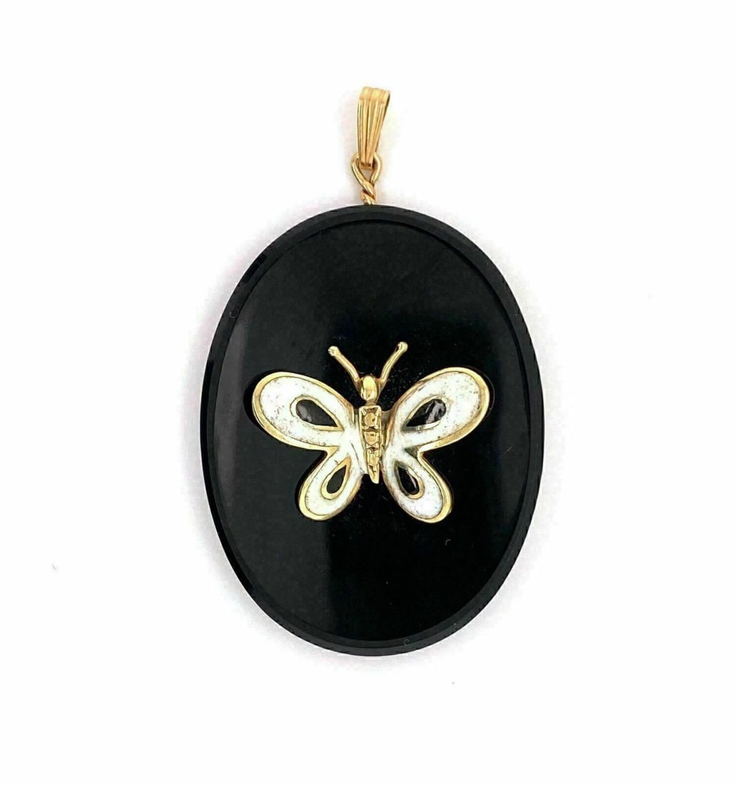 ONYX ENAMEL 14K YELLOW GOLD OVAL CHARM PENDANT: Onyx Enamel 14k Yellow Gold Oval Charm Pendant Brand: Unbranded Type: Pendant Material: 14k Yellow Gold Color: Yellow Size: Measurement: 2.09" long w/bail x 1.26" wide x 0.30" high Butterfly:
