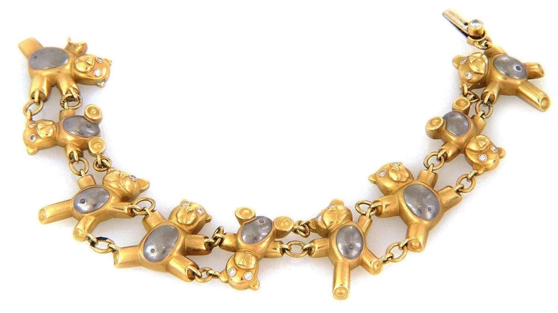 TEDDY BEAR DIAMOND 18K MULTI TONE GOLD LINK BRACELET: Teddy Bear Diamond 18k Multi Tone Gold Link Bracelet Brand: Unbranded Type: Bracelet Material: 18k yellow and white gold Color: None Size: Measurement: 7" long x 0.90" wide x 0.20" high 
