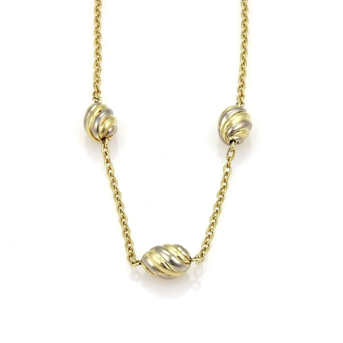 CARTIER 18K TWO TONE GOLD TRIPLE OVAL SWIRL CHARM CHAIN NECKLACE: Cartier 18k Two Tone Gold Triple Oval Swirl Charm Chain Necklace Brand: Cartier Type: Necklace Material: solid 18k white and yellow gold Color: None Size: Measurement: 15.5" long pendants: