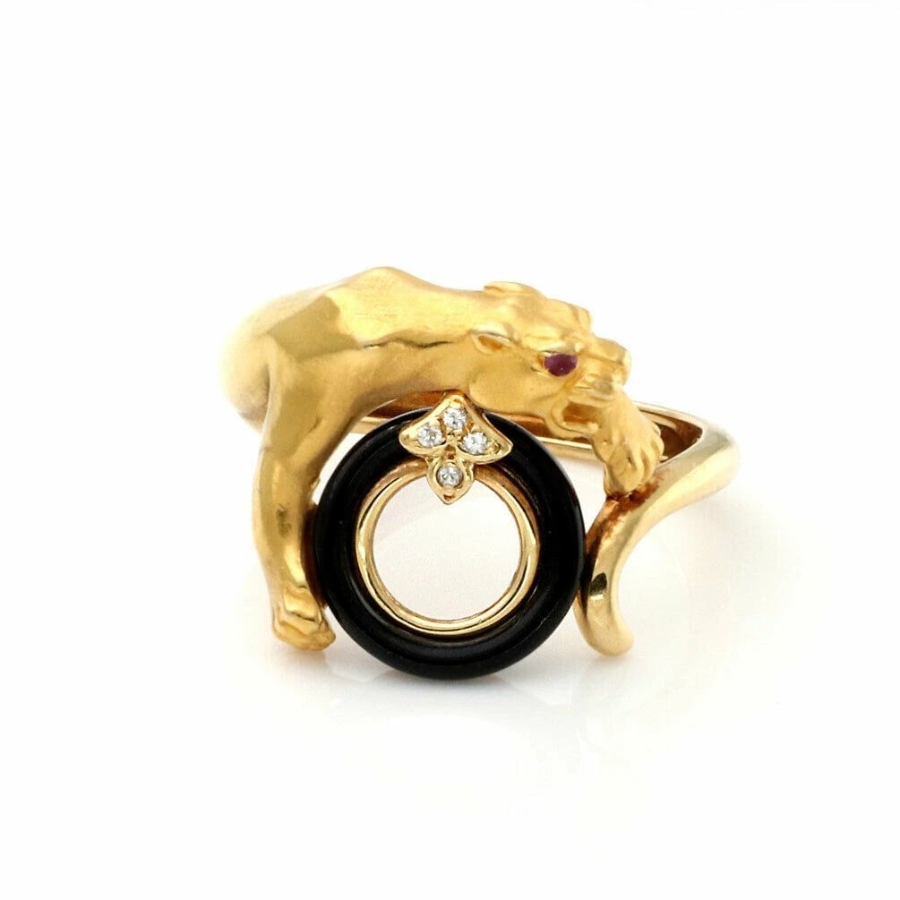 CARRERA Y CARRERA PANTHER RING DIAMOND ONYX RUBY: Carrera y Carrera Panther Ring Diamond Onyx Ruby Brand: Carrera y Carrera Type: Ring Material: 18k yellow gold Main Stone/Creation/Gemstone Gemstones: black onyx ruby (eye) and Color: None 