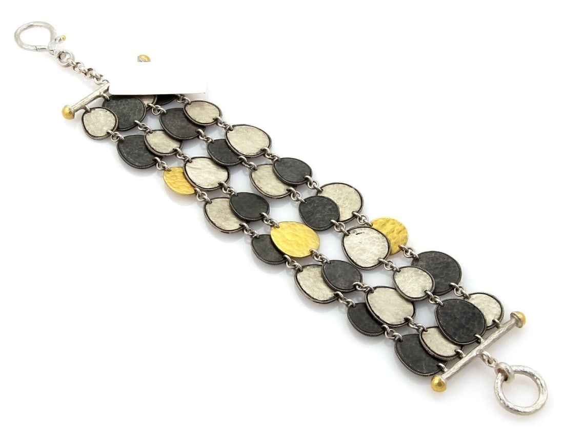 GURHAN CONTOUR STERLING & 24K INLAY GOLD BRACELET: Gurhan Contour Sterling & 24k Inlay Gold Bracelet Brand: Guhan Type: Bracelet Material: 925sterling silver & 24k gold inlay Color: none Size: Measurement: 8" long x 1.5" Accessories: None