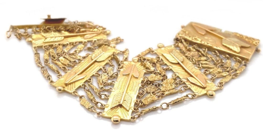 MULTI STRAND ARROW BARS WIDE BRACELET: Multi Strand Arrow Bars Wide Bracelet Brand: Unbranded Type: Bracelet Material: 18k yellow gold Color: Yellow Size: Measurement: 7" long x 1.45" wide Accessories: None Accessories Notice: