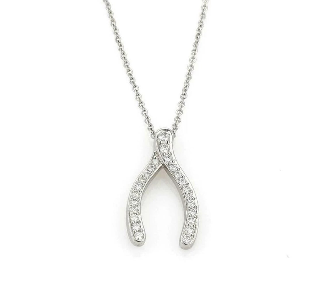 TIFFANY & CO. DIAMOND PLATINUM WISHBONE PENDANT NECKLACE: Tiffany & Co. Diamond Platinum Wishbone Pendant Necklace Brand: Tiffany & Co. Type: Necklace Material: PT950 Color: Pt Size: Measurement: 16" long Pendant: 0.82" long x 0.45" wide and 2.2mm Acces