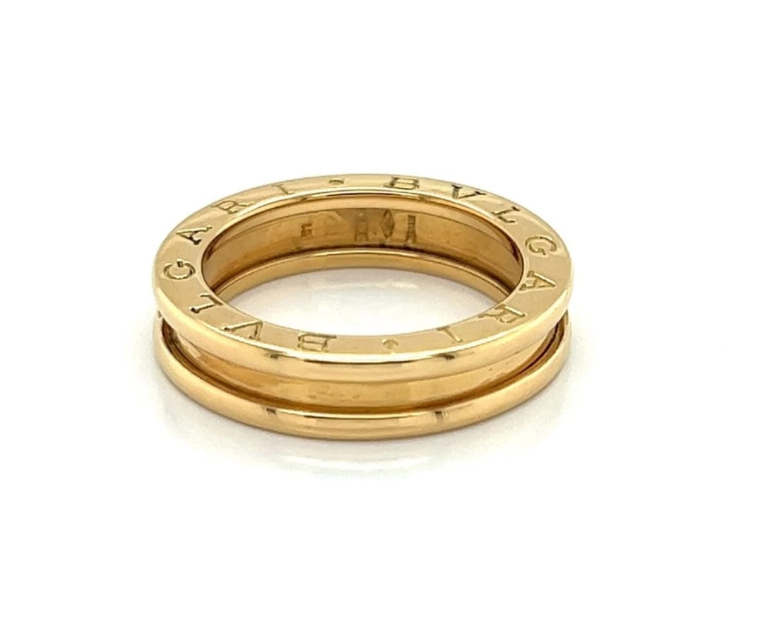 BVLGARI B.ZERO1 ONE BAND RING 18K YELLOW GOLD: Bvlgari B.Zero1 One Band Ring 18K Yellow Gold Brand: Bvlgari Type: Ring Material: 18k yellow gold Color: None Size: 5.5 US Accessories: None Accessories Notice: When purchasing pre-owned