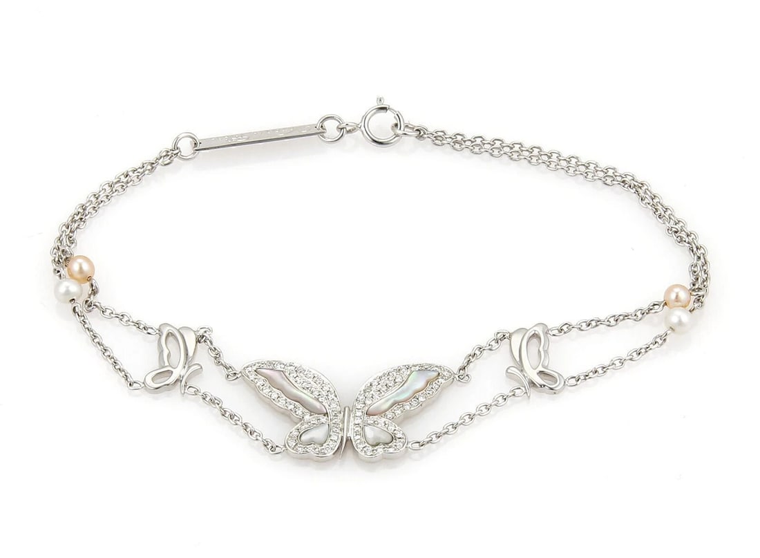 VICTORIA CASAL FLY ME MOP BUTTERFLY BRACELET: Victoria Casal Fly Me MOP Butterfly Bracelet Brand: Victoria Casal Type: Bracelet Material: 18k white gold Color: white Size: Measurement: 7" long x 9mm wide · Charm: butterfly 22mm long x