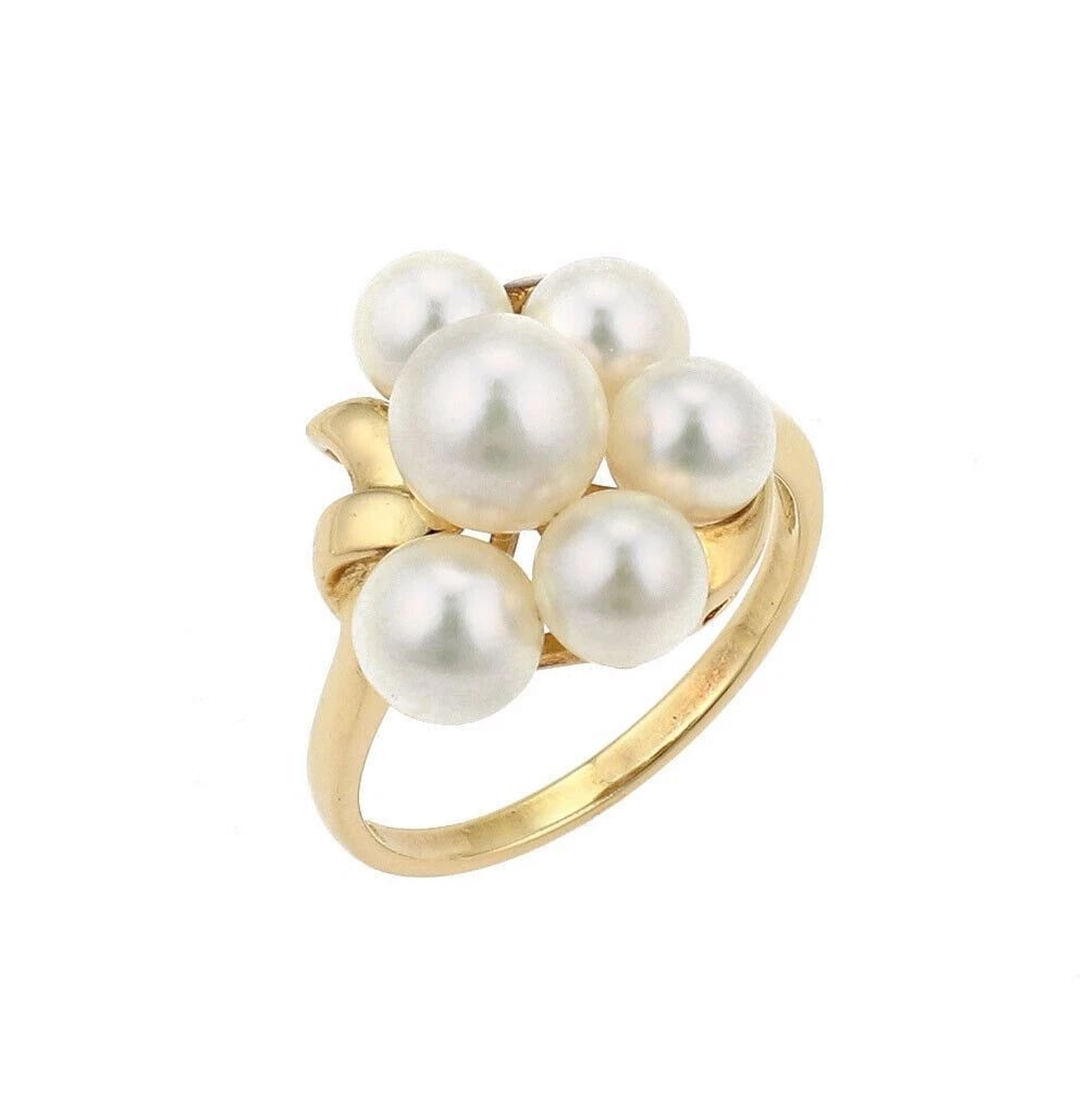 MIKIMOTO AKOYA PEARL CLUSTER RING: Mikimoto Akoya Pearl Cluster Ring Brand: Mikimoto Type: Ring Material: 18k yellow gold Main Stone/Creation/Gemstone Pearls: Akoya pearls Color: None Size: 6.5 US Accessories: None Accessories