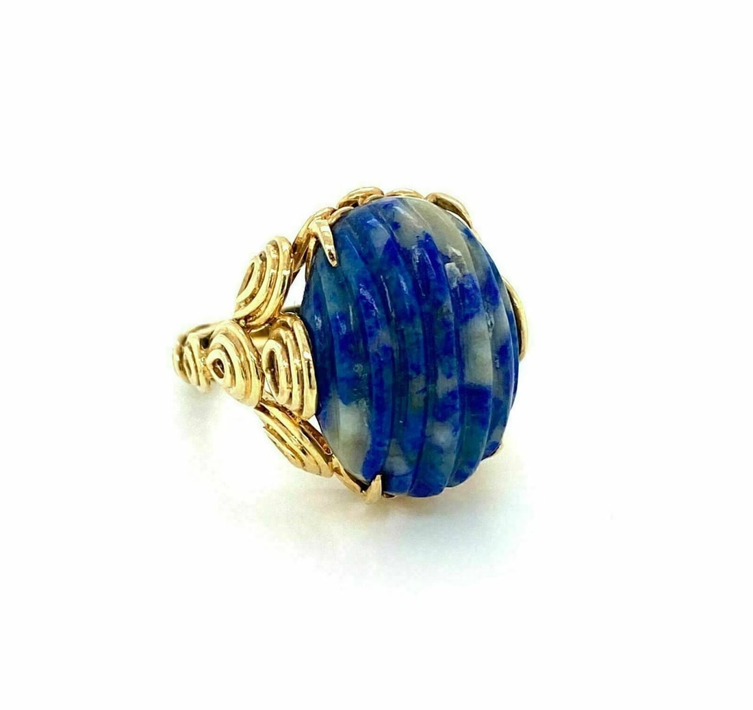 MARBLE LAPIS CABOCHON RING: Marble Lapis Cabochon Ring Brand: Unbranded Type: Ring Material: 14k yellow gold Main Stone/Creation/Gemstone Gemstone: Lapis Color: None Size: 6.5 US Accessories: None Accessories Notice:
