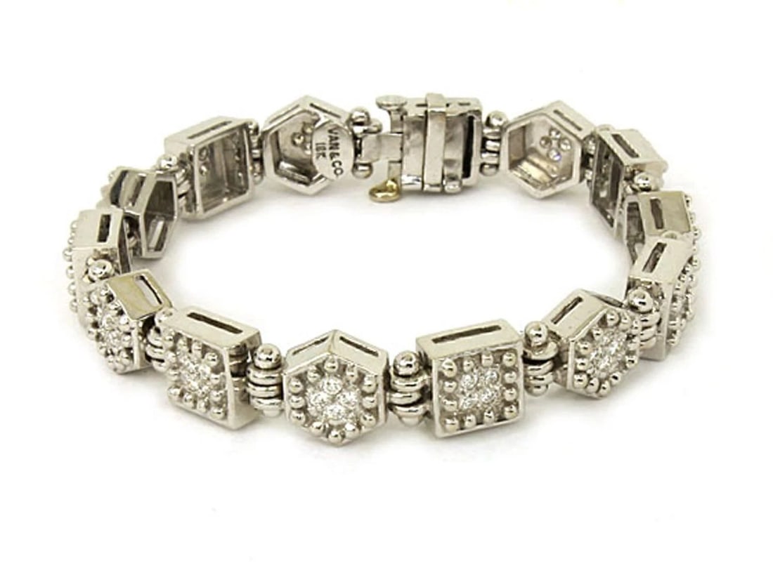 IVAN & CO. DIAMOND 18K GOLD OCTAGON SQUARE LINK BRACELET VINTAGE: Ivan & Co. Diamond 18k Gold Octagon Square Link Bracelet Vintage Brand: Ivan & Co. Type: Bracelet Material: 18k white gold Main Stone/Creation/Gemstone Gemstones: Color: None Size: Measurements: 6