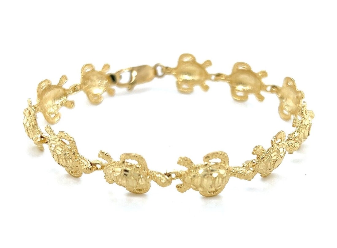 ALL AROUND TURTLE CHARM LINK 14K YELLOW GOLD BRACELET: All Around Turtle Charm Link 14k Yellow Gold Bracelet Brand: Unbranded Type: Bracelet Material: 14k yellow gold Color: yellow Size: Measurements: 7.25" x 11mm wide x 3mm high Accessories: