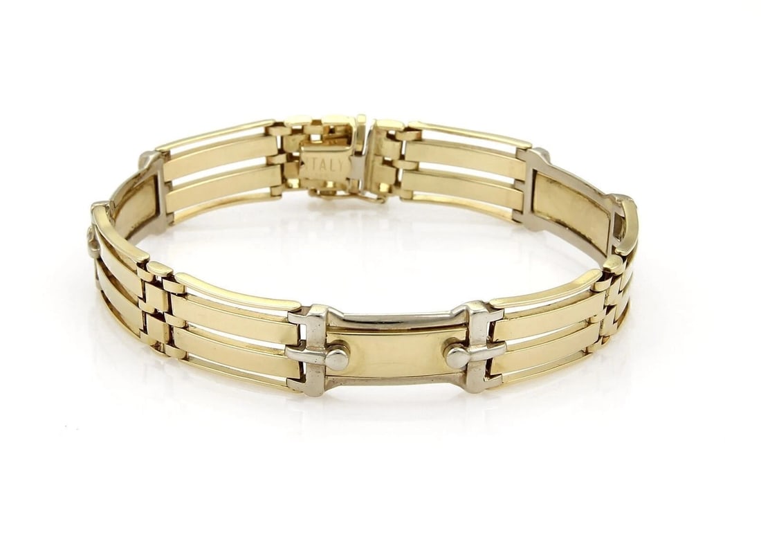 LONG CURVED FANCY GATE LINK BRACELET: Long Curved Fancy Gate Link Bracelet Brand: Unbranded Type: Bracelet Material: 14k yellow & White gold Color: None Size: Measurement: 8" long x 0.46" wide Accessories: None Accessories Not