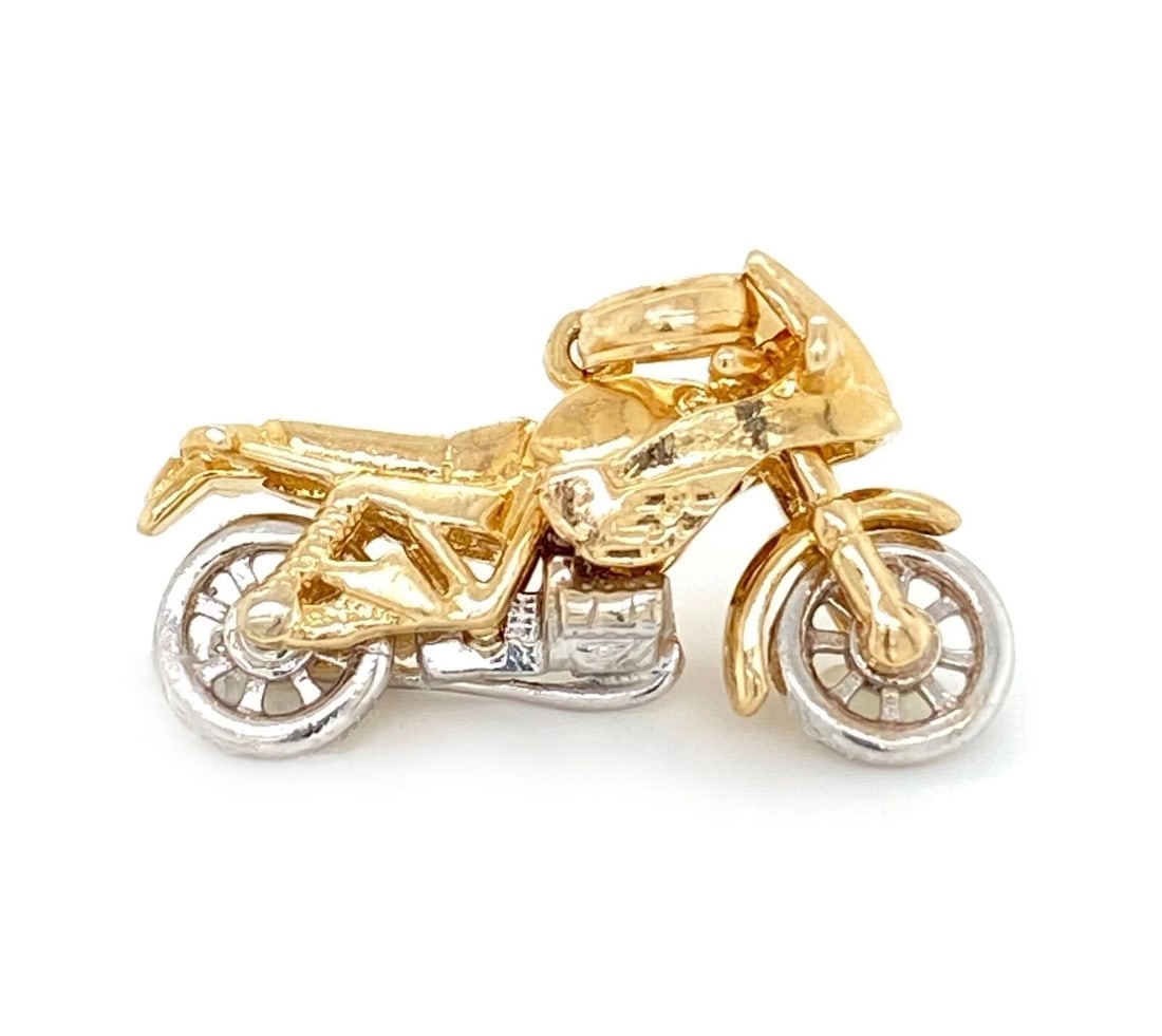 MOTORCYCLE 14K GOLD CHARM PENDANT: Motorcycle 14k Gold Charm Pendant Brand: Unbranded Type: pendant Material: 14k yellow and white gold Color: none Size: Measurement: 0.72" tall with bail x 1" long x 0.41" wide Without bail: