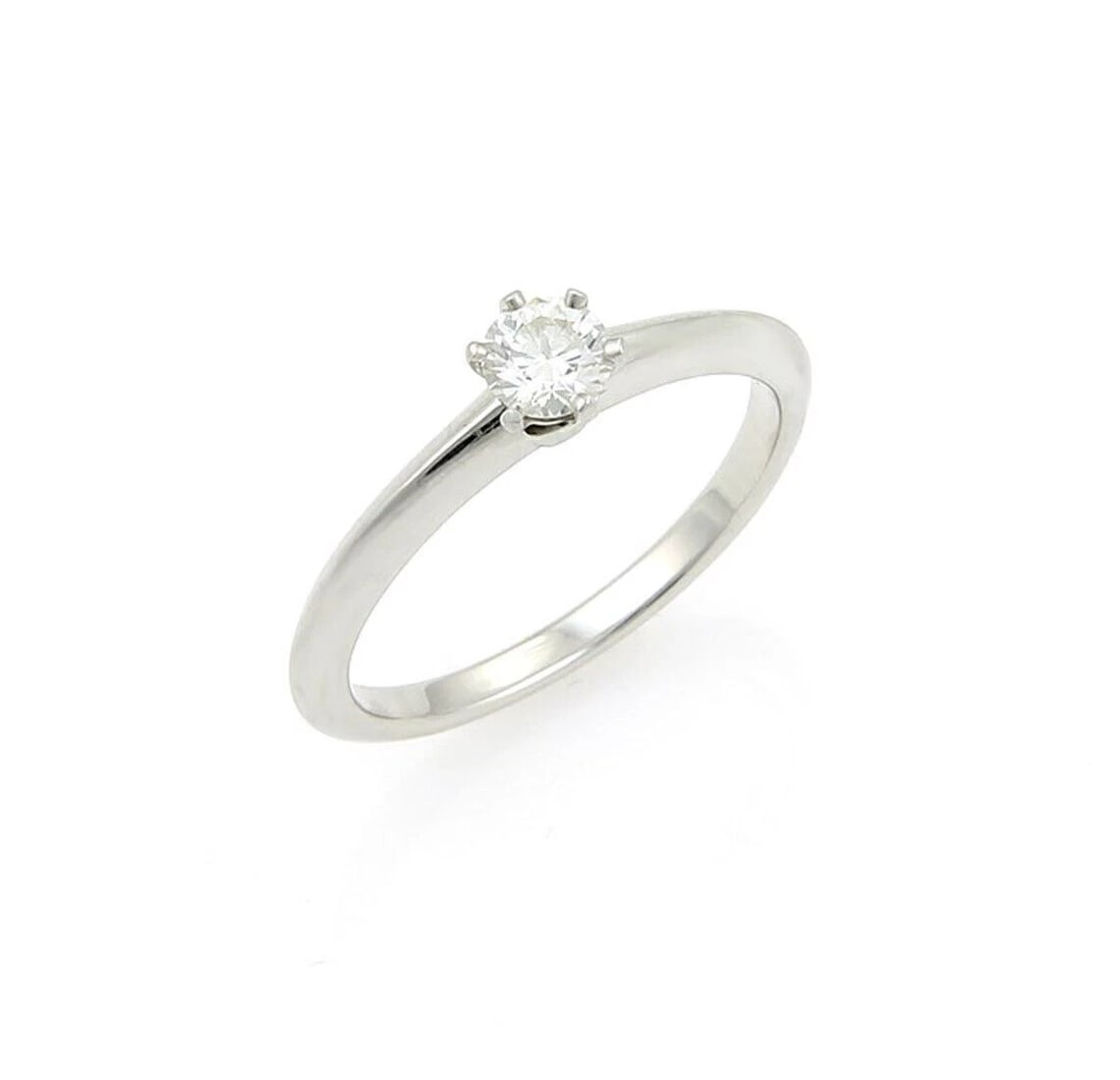 TIFFANY & CO. PLATINUM DIAMOND SOLITAIRE RING: Tiffany & Co. Platinum Diamond Solitaire Ring Brand: Tiffany & Co. Type: Ring Material: PT950 Color: Pt Size: 4.5 US Accessories: None Accessories Notice: When purchasing pre-owned goods,