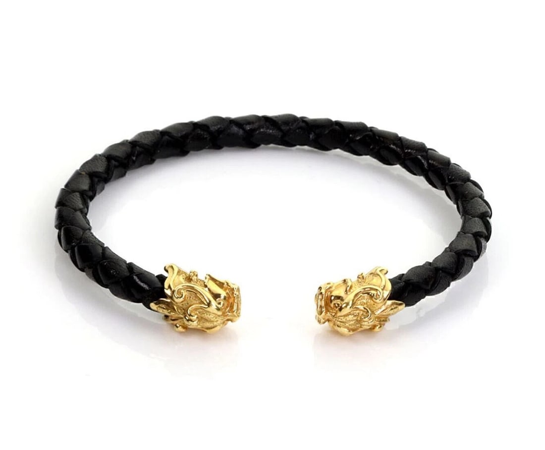 CARRERA Y CARRERA WOVEN DRAGON HEAD CUFF BRACELET: Carrera y Carrera Woven Dragon Head Cuff Bracelet Brand: Carrera y Carrera Type: Bracelet Material: 18k yellow gold Color: None Size: Measurement: 6.75" w/opening x 5.5mm thick Dragon head: