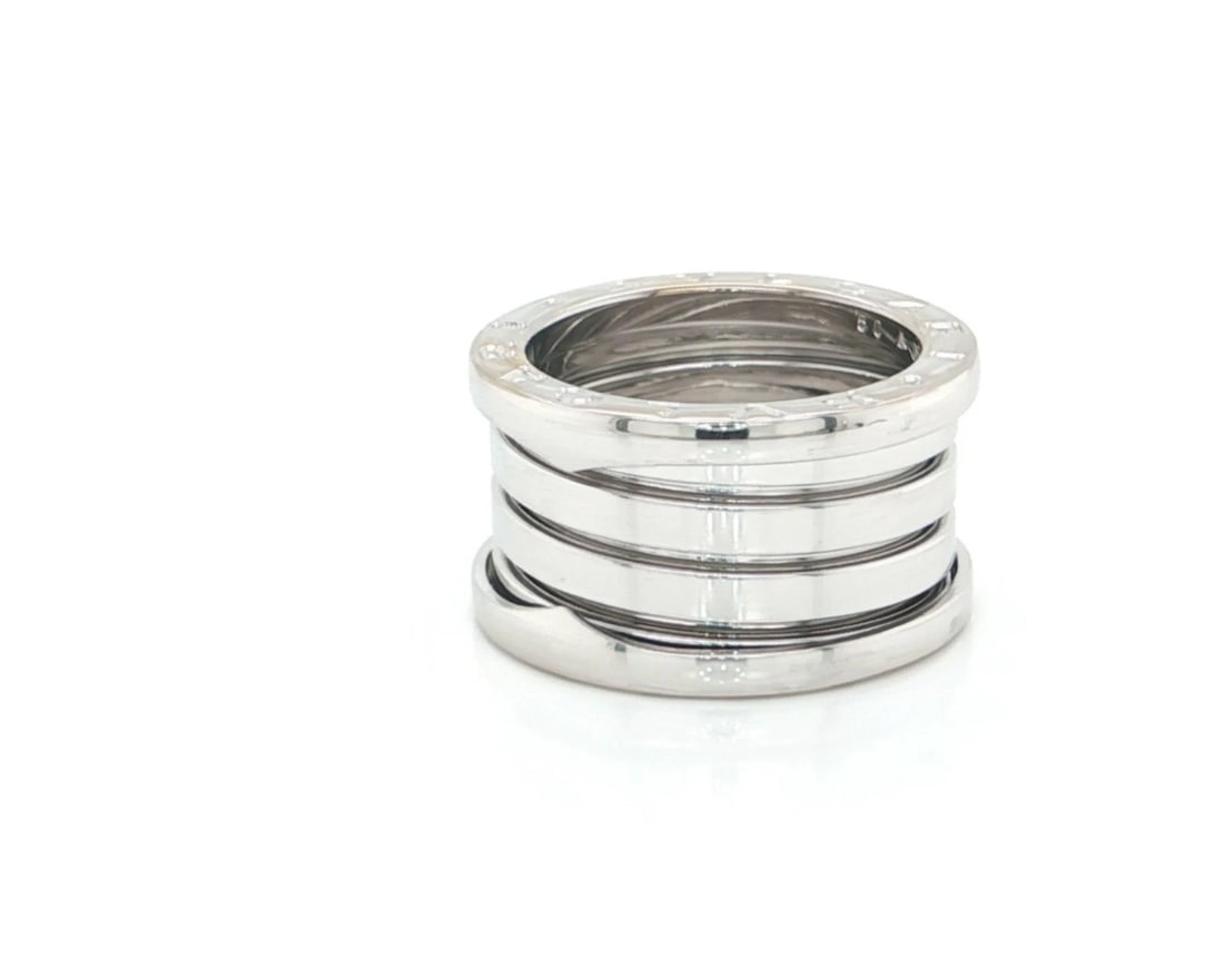 BVLGARI B.ZERO1 FOUR BAND RING IN 18K WHITE GOLD: Bvlgari B.zero1 Four Band Ring in 18k White Gold Brand: Bvlgari Type: Ring Material: 18k White Gold Color: White Size: 5 US Accessories: None Accessories Notice: When purchasing pre-owned