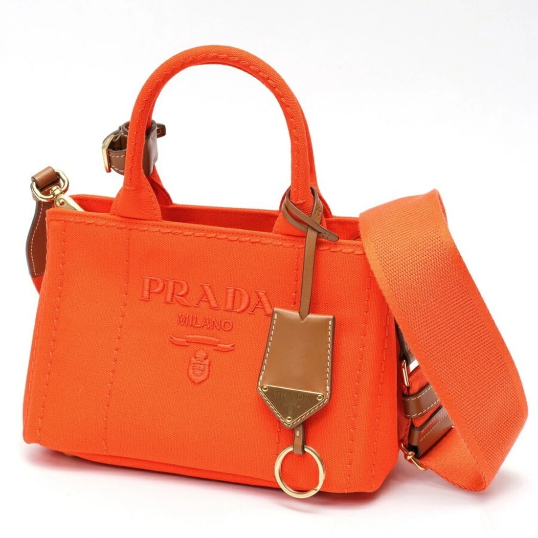 PRADA JARDINIERE MINI HANDBAG CANAPA TOTE BAG: PRADA Jardiniere Mini Handbag Canapa Tote Bag Brand: Prada Type/Style: Handbag, Tote bag Material: Cotton , Canvas Color: Orange Size: Size (HxWxD) 15cm x 22cm x 13cm / 5.9'' x 8.66'' x 5.11''
