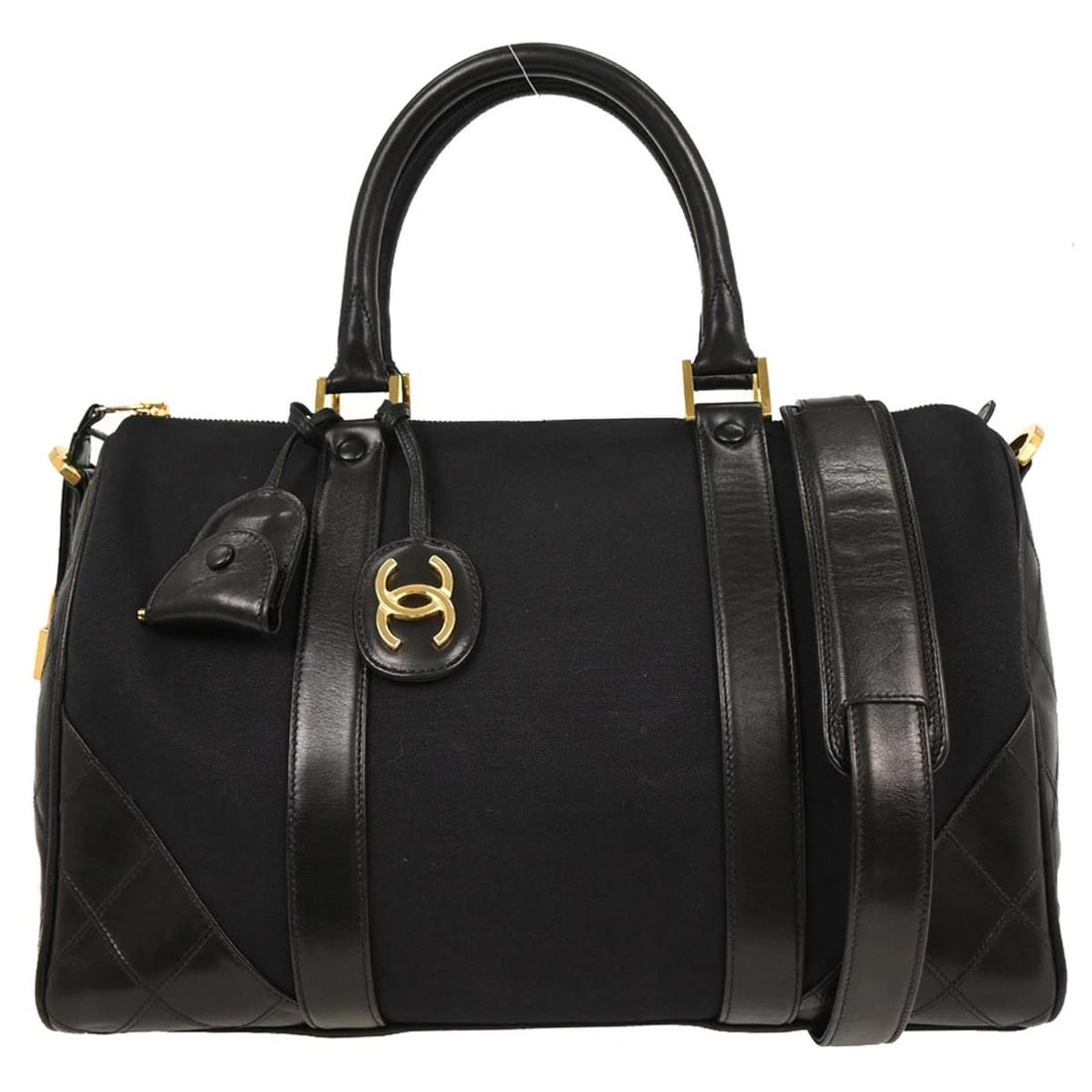 CHANEL BLACK CANVAS LAMBSKIN BICOLORE 2WAY DUFFLE HANDBAG: Chanel Black Canvas Lambskin Bicolore 2way Duffle Handbag Brand: CHANEL Type/Style: Duffle Material: Canvas, Lambskin Color: Black Size: W 14.2 x H 9.1 x D 6.7 " Handle Drop. 5.1 " Accessories: N