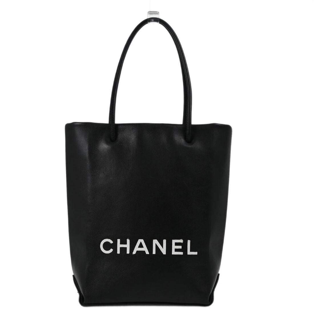 CHANEL BLACK CALFSKIN ESSENTIAL TOTE BAG: Chanel Black Calfskin Essential Tote Bag Brand: CHANEL Type/Style: Tote Material: Calfskin Leather Color: Black, White Size: W 5.9 x H 8.7 x D 3.1 " Handle Drop. 5.5 " Accessories: None Ac