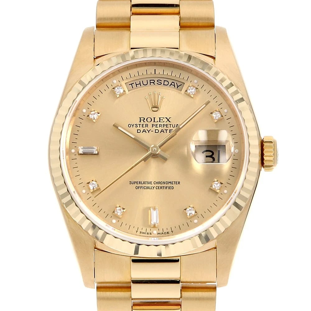 ROLEX DAY DATE 8P DIAMOND 2P BAGUETTE DIAMOND WRIST WATCH: ROLEX Day Date 8P Diamond 2P Baguette Diamond Wrist Watch Brand: ROLEX Type: Wrist watch Material: Band Material Yellow Gold, Case Material Yellow Gold Color: Champagne Gold Size: Case:W36mm Circu