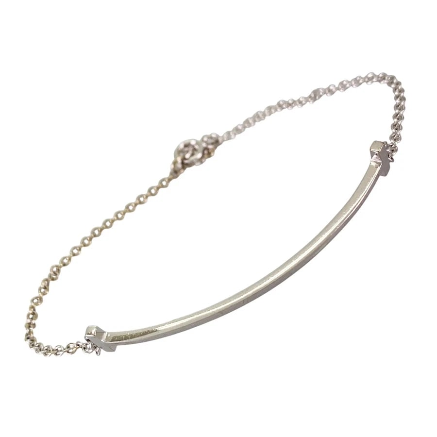 TIFFANY&CO. T SMILE WHITE GOLD BRACELET: TIFFANY&Co. T Smile White gold Bracelet Brand: TIFFANY&Co. Type/Style: Bracelet Material: 18K White Gold, Color: Silver Size: Motif size:8.7mm×41.6mm Wrist Size:17.5cm Accessories: None