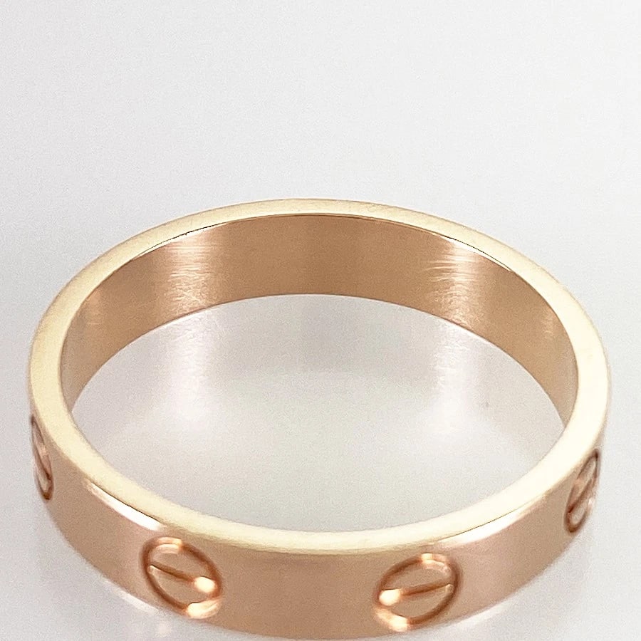 CARTIER MINI LOVE ROSE GOLD RING: Cartier Mini Love Rose gold Ring Brand: Cartier Type/Style: Ring Material: 18K Pink Gold, Color: Rose Gold Size: US:7 Accessories: None Accessories Notice: When purchasing pre-owned goods,