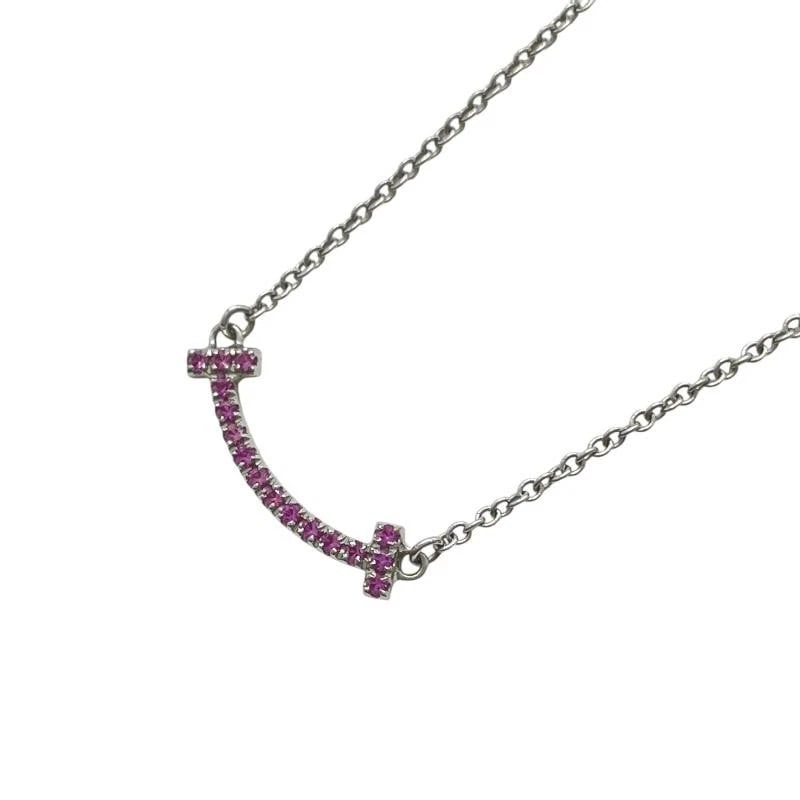 TIFFANY & CO. T SMILE MINI 750 WHITE GOLD NECKLACE: Tiffany & Co. T Smile Mini 750 White Gold Necklace Brand: Tiffany & Co. Type/Style: Necklace Material: Metal Purity 750, Metal White Gold, Color: White Gold Size: Length: Approx. 4.4mmWidth: Appro