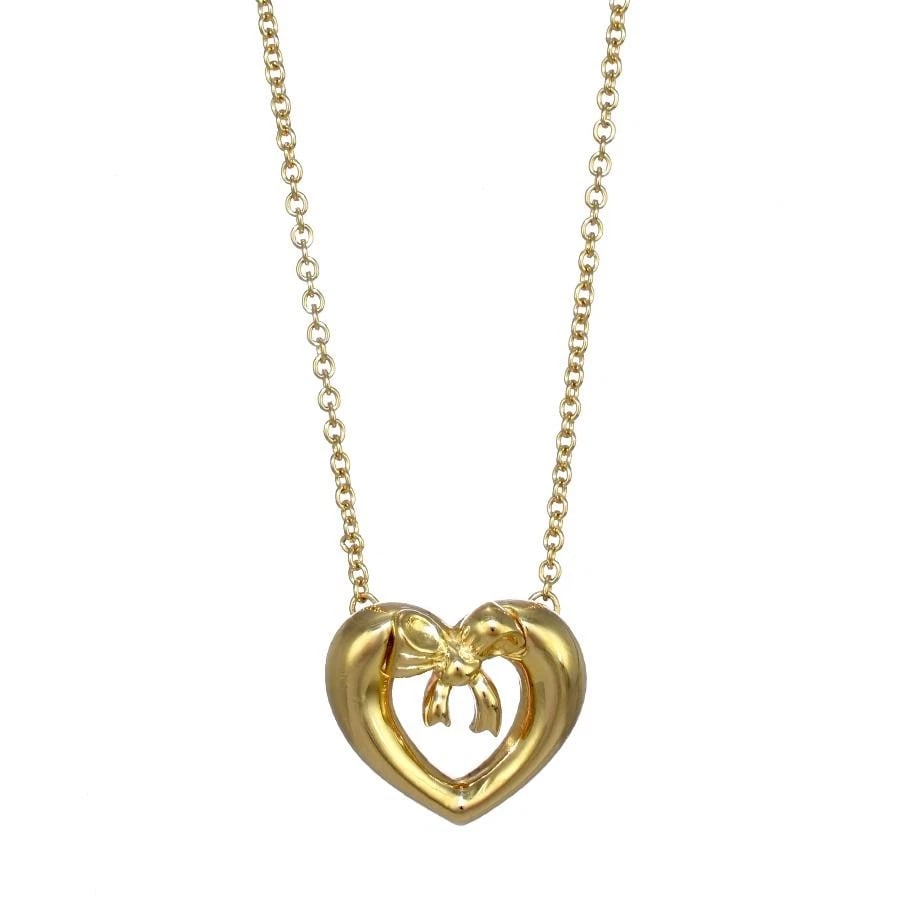 TIFFANY & CO. HEART BOW RIBBON K18YG NECKLACE: Tiffany & Co. Heart Bow Ribbon K18YG Necklace Brand: Tiffany & Co. Type/Style: Necklace Material: Metal Purity K18, Metal Yellow Gold, Color: Yellow Gold Size: Top: H12.0mm x W12.8mmChain length: