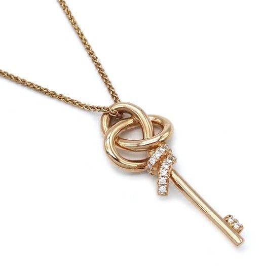 TIFFANY & CO. KNOT KEY DIAMOND MINI NECKLACE: Tiffany & Co. Knot Key Diamond Mini Necklace Brand: Tiffany & Co. Type/Style: Necklace Material: Metal Purity Au750, Metal K18 Pink Gold, Main Stone/Creation Natural Color: Pink Gold Size: Motif: