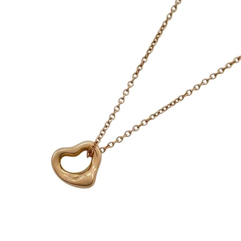 TIFFANY & CO. OPEN HEART PINK GOLD 750 NECKLACE: Tiffany & Co. Open Heart Pink Gold 750 Necklace Brand: Tiffany & Co. Type/Style: Necklace Material: Metal Purity 750, Metal Pink Gold, Color: Pink Gold Size: Length: Approx. 6.2mmWidth: Approx. 7.