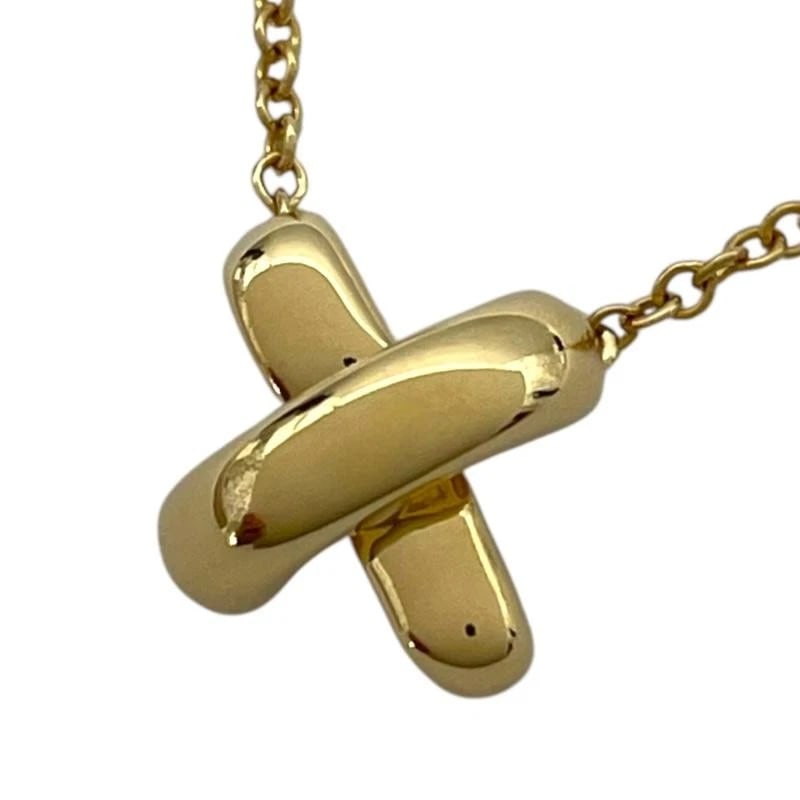 TIFFANY & CO. CROSS STITCH GOLD 750 NECKLACE: Tiffany & Co. Cross Stitch Gold 750 Necklace Brand: Tiffany & Co. Type/Style: Necklace Material: Metal Purity 750, Metal Gold, Color: Gold Size: Length: Approx. 8.6mmWidth: Approx. 9.4mmChain