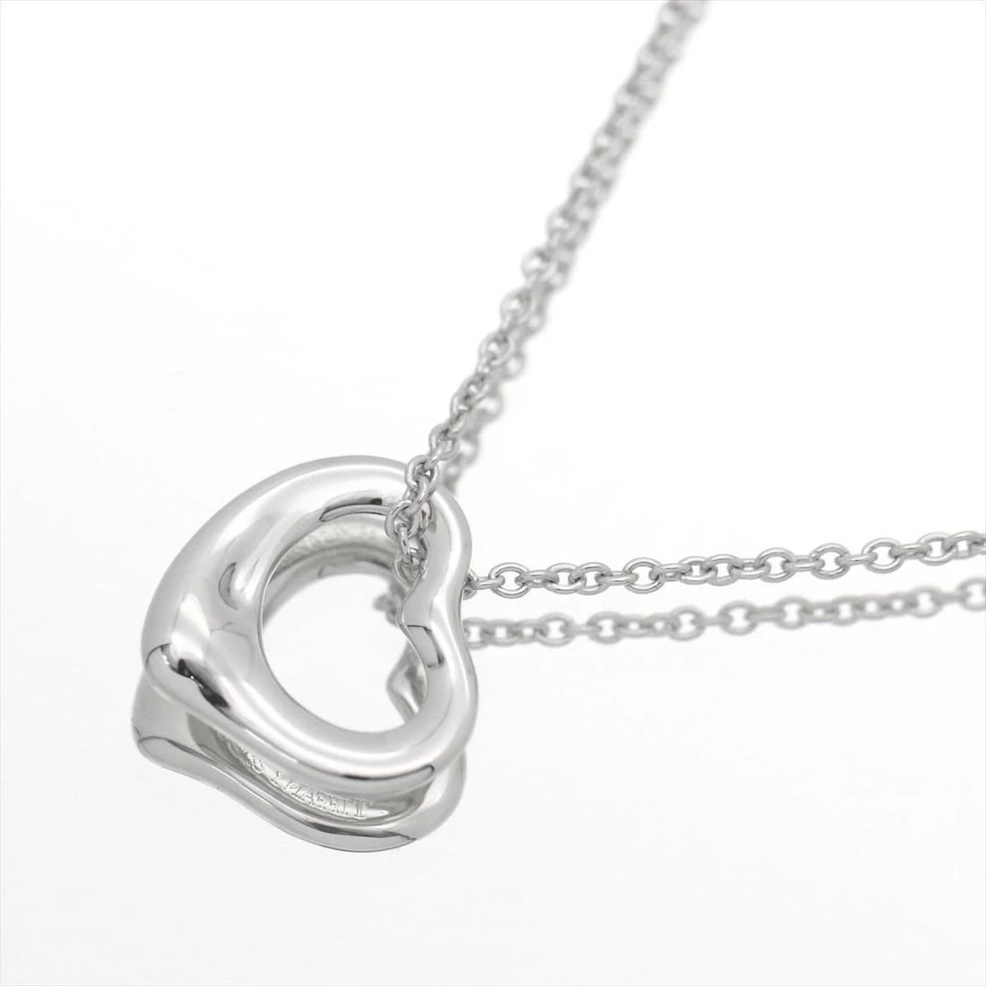 TIFFANY ELSA PERETTI OPEN HEART PENDANT NECKLACE: Tiffany Elsa Peretti Open Heart Pendant Necklace Brand: Tiffany & Co. Type/Style: Necklace Material: Metal Purity Pt950, Metal Pt950 (Platinum), Main Stone/Creation Natural Color: Platinum 