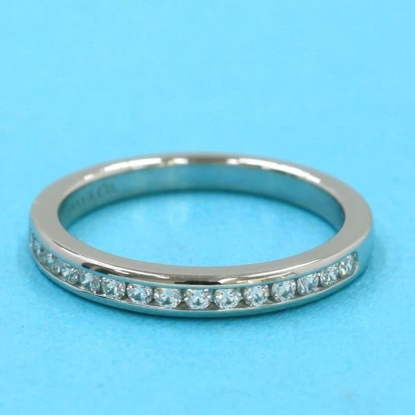 TIFFANY & CO. HALF CIRCLE CHANNEL SETTING RING: Tiffany & Co. Half Circle Channel Setting Ring Brand: Tiffany & Co. Type/Style: Ring Material: Metal Purity Pt950, Metal Platinum, Color: Platinum Size: US 4.5 Accessories: None Accessorie