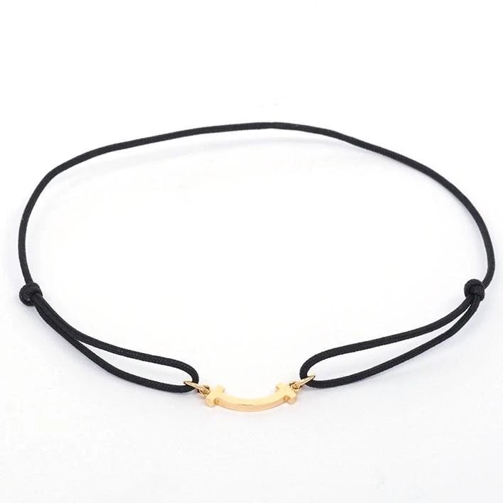 TIFFANY & CO. T SMILE K18 GOLD BLACK CORD BRACELET: Tiffany & Co. T Smile K18 Gold Black Cord Bracelet Brand: Tiffany & Co. Type/Style: Bracelet Material: Metal Purity K18, Metal Pink Gold, Color: Pink Gold Size: Arm circumference: approx. 16cm - 2