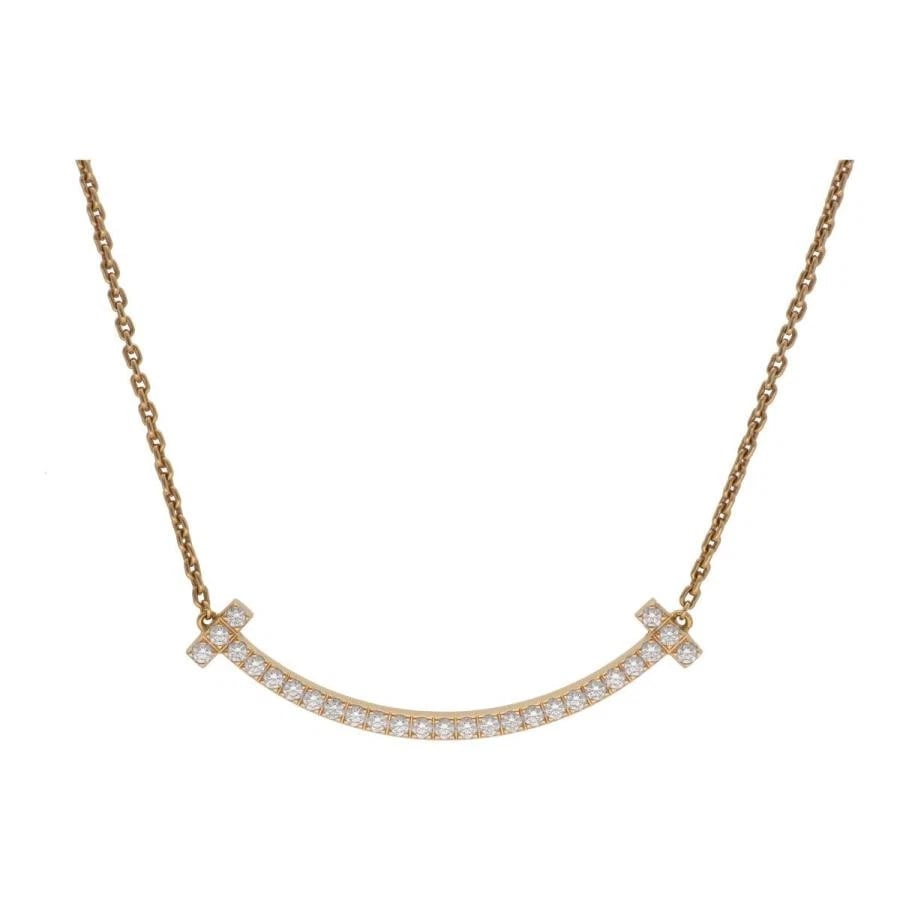 TIFFANY & CO. T SMILE DIAMOND K18RG NECKLACE: Tiffany & Co. T Smile Diamond K18RG Necklace Brand: Tiffany & Co. Type/Style: Necklace Material: Metal Purity K18, Metal Rose Gold, Main Stone/Creation Natural Color: Rose Gold Size: Pendant: (W)