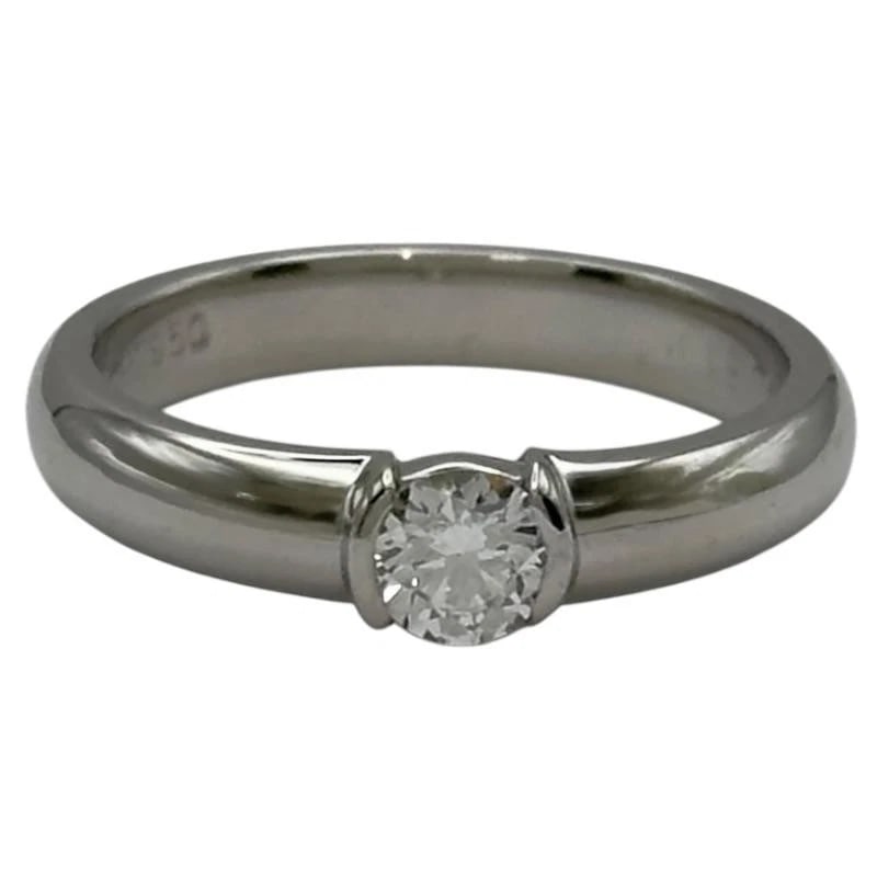 TIFFANY & CO. DOTS DIAMOND PLATINUM WOMEN'S RING: Tiffany & Co. Dots Diamond Platinum Women's Ring Brand: Tiffany & Co. Type/Style: Ring Material: Metal Purity Pt950, Metal Platinum, Main Stone/Creation Natural Color: Platinum Size: US 5 Accesso