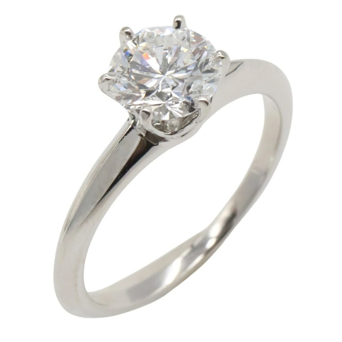 TIFFANY & CO. CLASSIC SOLITAIRE DIAMOND PT950 RING: Tiffany & Co. Classic Solitaire Diamond Pt950 Ring Brand: Tiffany & Co. Type/Style: Ring Material: Metal Purity Pt950, Metal Platinum, Main Stone/Creation Natural Color: Platinum Size: US 3 Acces