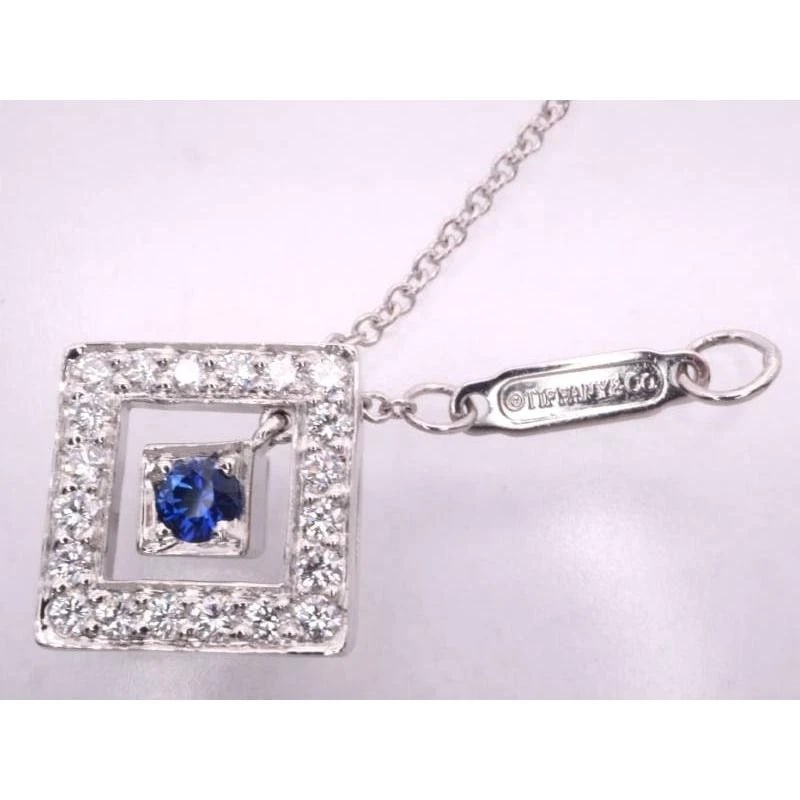 TIFFANY & CO. SAPPHIRE DIAMOND PT950 NECKLACE: Tiffany & Co. Sapphire Diamond Pt950 Necklace Brand: Tiffany & Co. Type/Style: Necklace Material: Metal Purity Pt950, Metal Platinum, Main Stone/Creation Natural Color: Platinum Size: Pendant W0.9