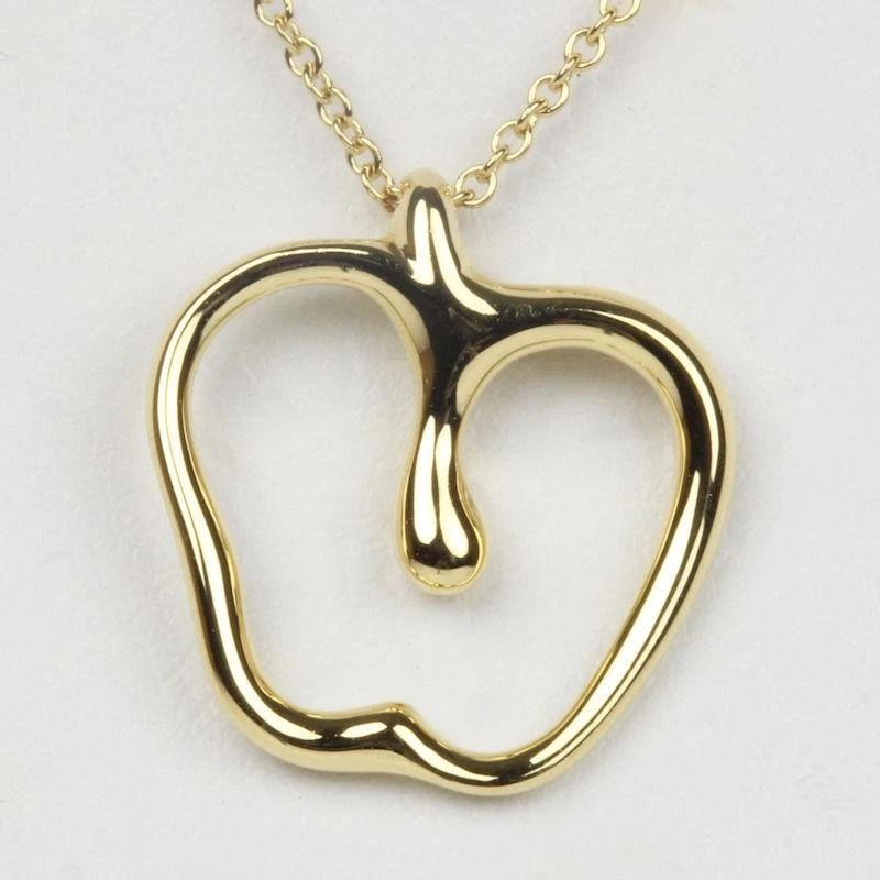 TIFFANY & CO. ELSA PERETTI APPLE K18YG NECKLACE: Tiffany & Co. Elsa Peretti Apple K18YG Necklace Brand: Tiffany & Co. Type/Style: Necklace Material: Metal Purity K18, Metal Yellow Gold, Main Stone/Creation Natural Color: Yellow Gold Size: